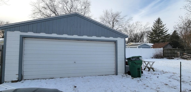 view of snow covered garage