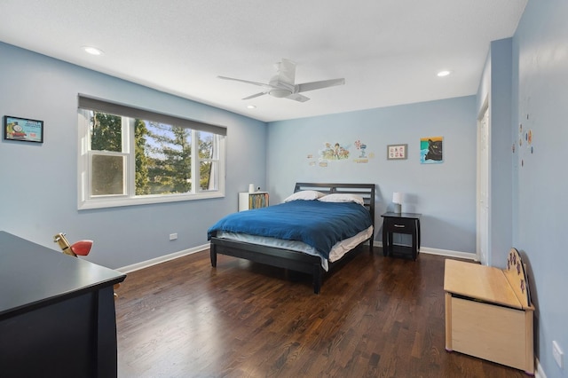 bedroom featuring dark hardwood / wood-style floors and ceiling fan