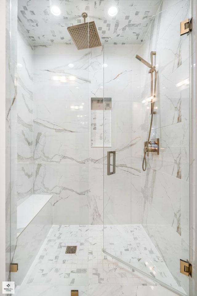 bathroom featuring an enclosed shower