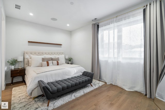 bedroom with light wood-type flooring