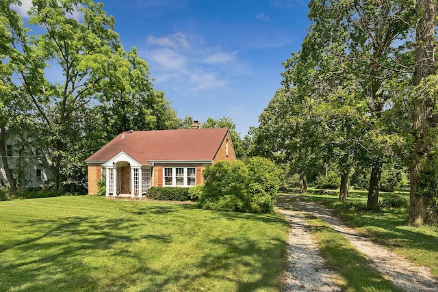 view of front of property with a front lawn