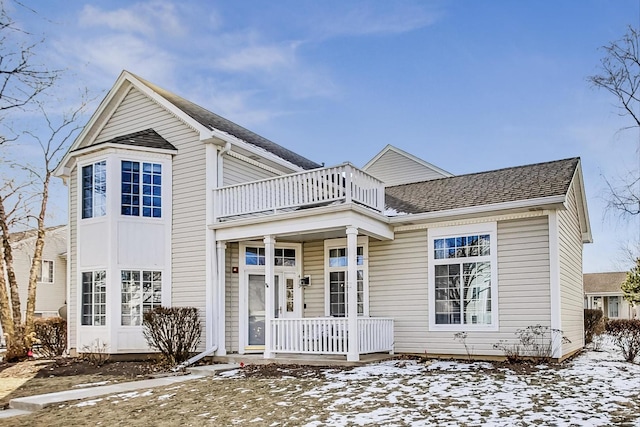 front of property with a balcony