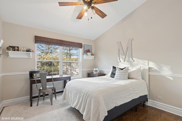 bedroom featuring vaulted ceiling, hardwood / wood-style floors, and ceiling fan