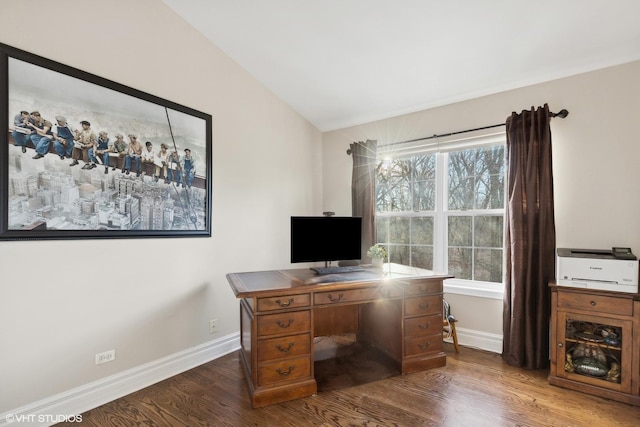 office area featuring dark hardwood / wood-style flooring, lofted ceiling, and a healthy amount of sunlight