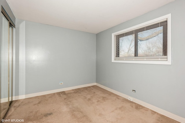 view of carpeted spare room