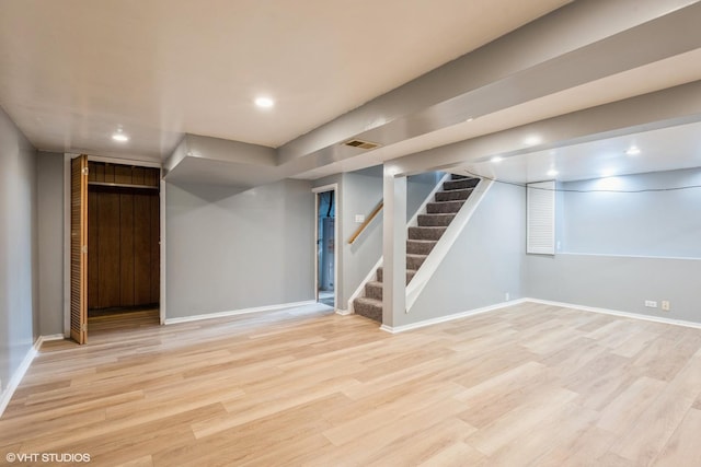 basement featuring light wood-type flooring