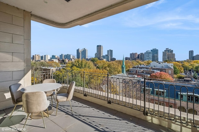 balcony featuring a view of city