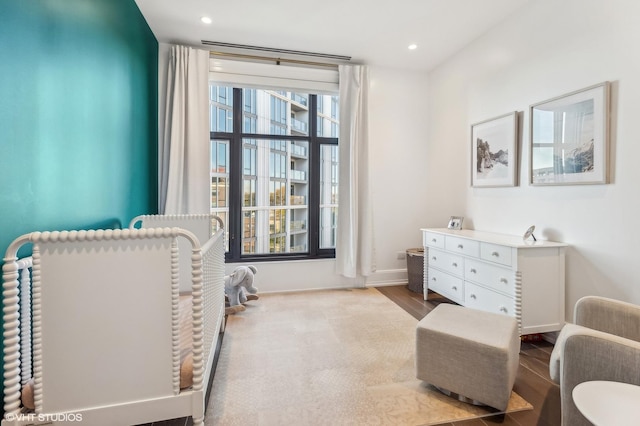 bedroom with recessed lighting and baseboards