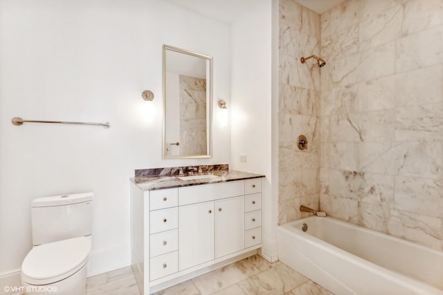 bathroom with toilet, marble finish floor, bathtub / shower combination, and vanity