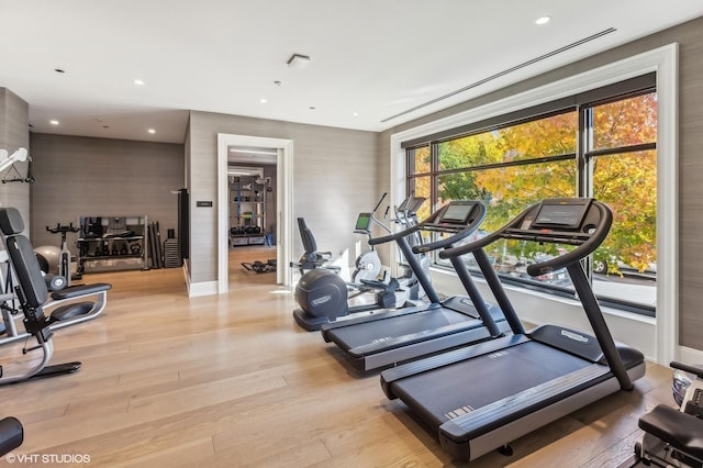 gym featuring recessed lighting and wood finished floors