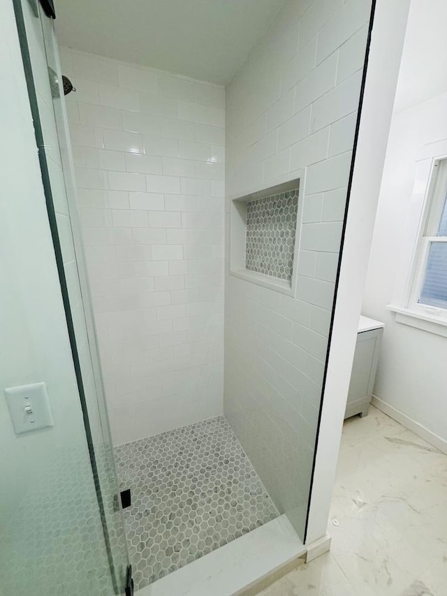 bathroom with vanity and walk in shower