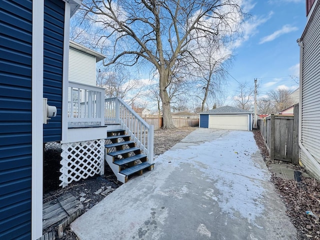 view of yard featuring an outbuilding and a garage