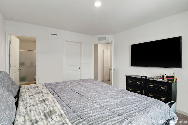 carpeted bedroom featuring a closet