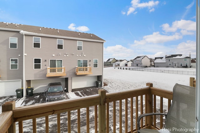 view of snow covered deck