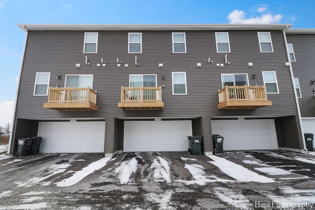 rear view of property with a balcony