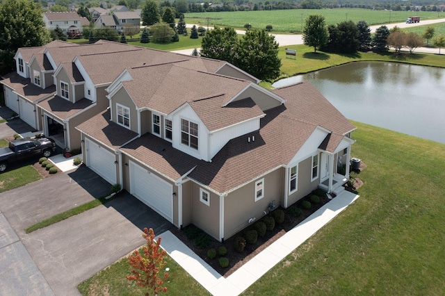 bird's eye view with a water view