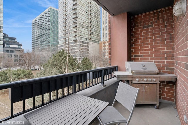 balcony featuring area for grilling