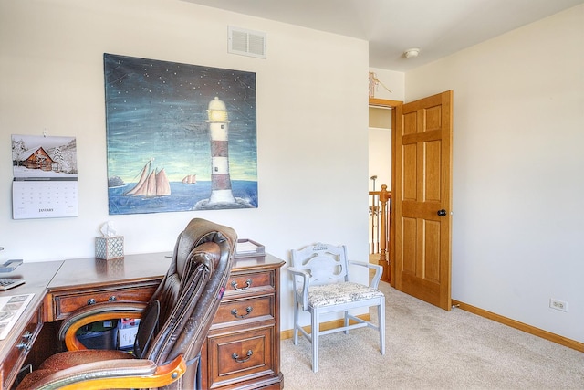 office area with light colored carpet