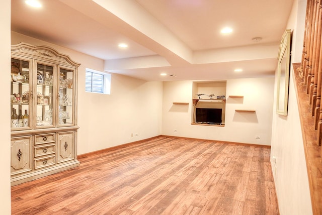 unfurnished living room with light hardwood / wood-style floors