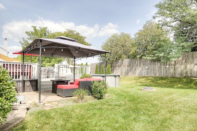 view of yard featuring an outdoor living space, a gazebo, and a deck