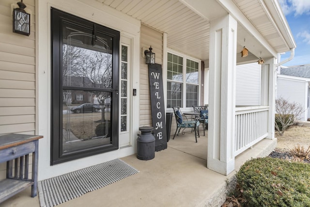 doorway to property featuring a porch