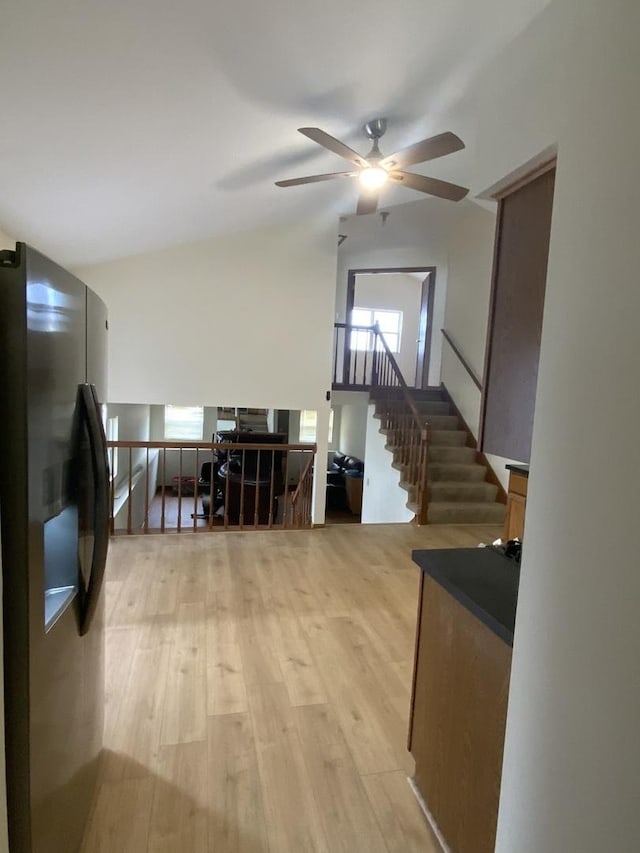 hall with light hardwood / wood-style floors