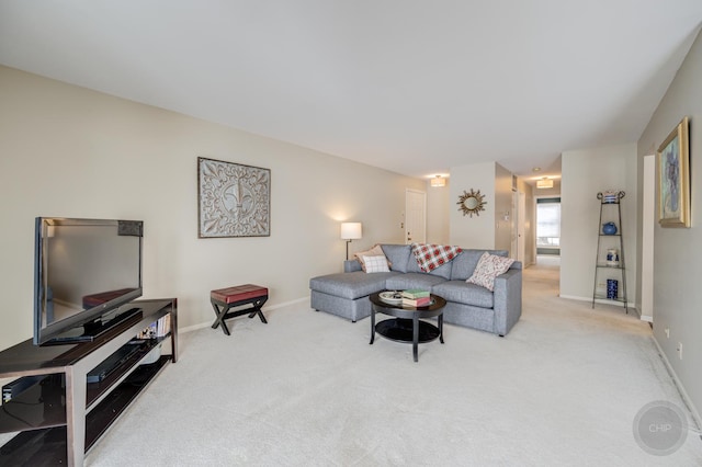 living room featuring light colored carpet