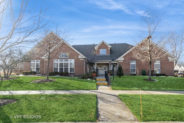 front of property featuring covered porch and a front lawn