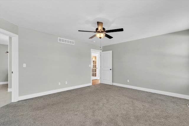 carpeted empty room with ceiling fan