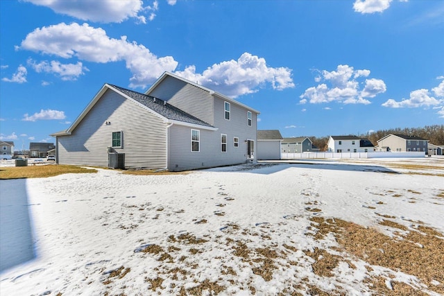 view of snow covered house