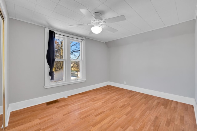 additional living space featuring ceiling fan and light wood-type flooring