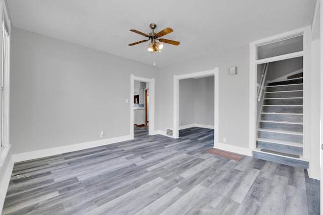 interior space featuring ceiling fan and light wood-type flooring