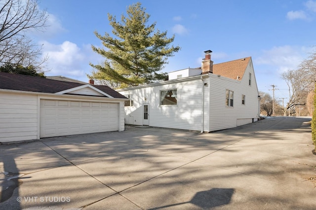 view of side of property featuring a garage