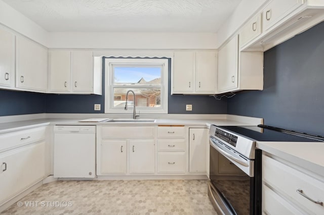 kitchen featuring stainless steel electric range oven, white cabinetry, sink, white dishwasher, and a textured ceiling