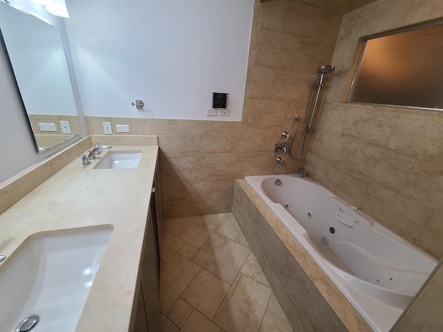 bathroom featuring vanity, tiled shower / bath combo, tile patterned floors, and tile walls