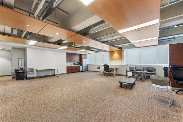 miscellaneous room featuring carpet flooring