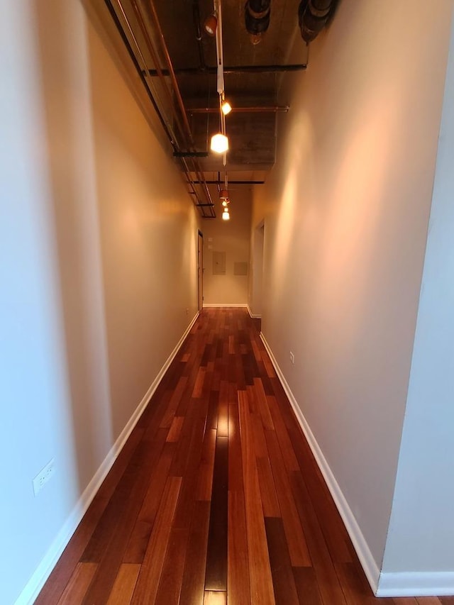 corridor with dark wood-type flooring