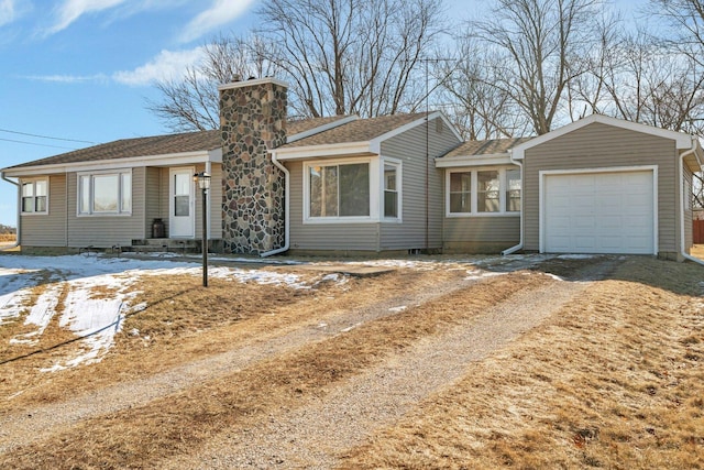 single story home with a garage