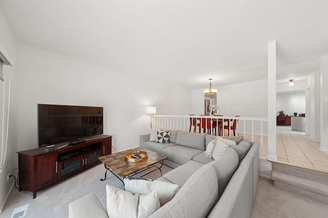 living room featuring light carpet