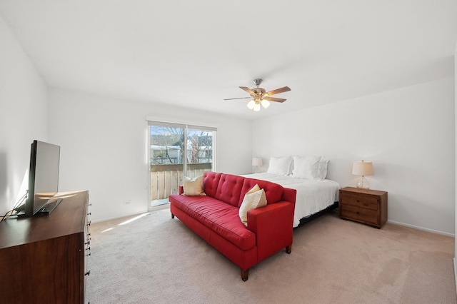 bedroom with light carpet, access to exterior, baseboards, and a ceiling fan