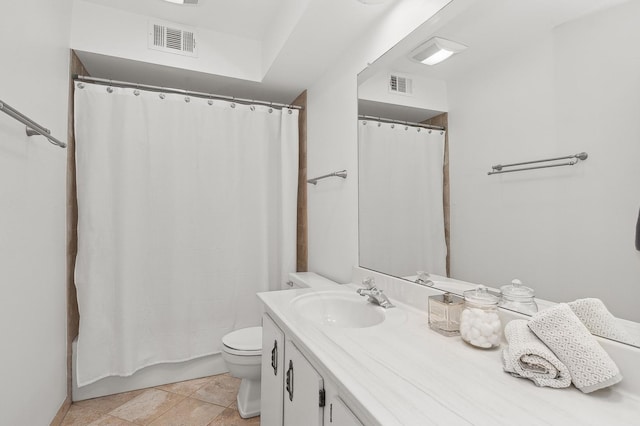 bathroom featuring shower / bath combo, visible vents, vanity, and toilet