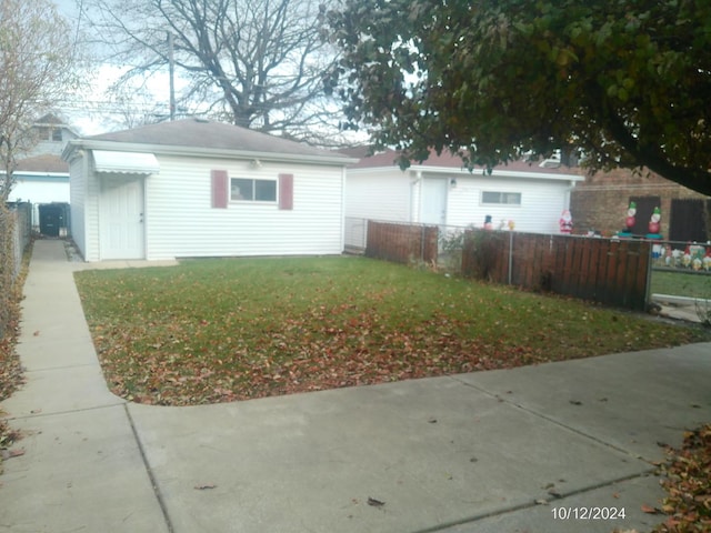 view of property exterior with a yard