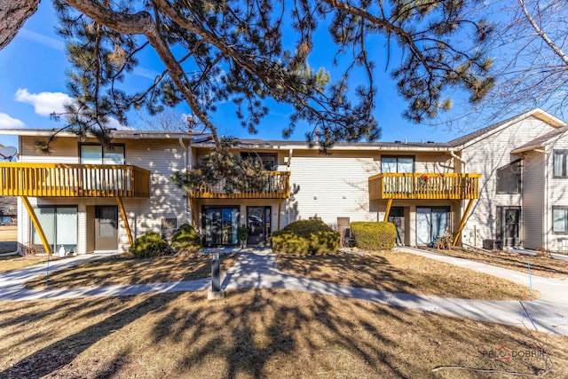 view of front of house with a balcony