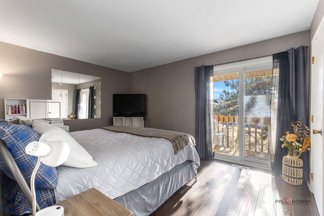 bedroom featuring access to exterior and light hardwood / wood-style flooring