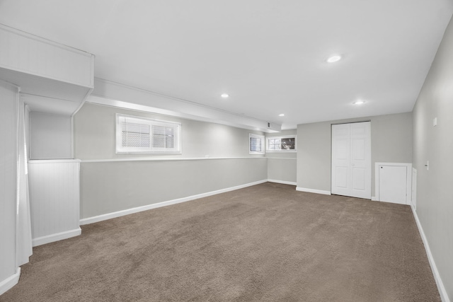 basement featuring carpet flooring