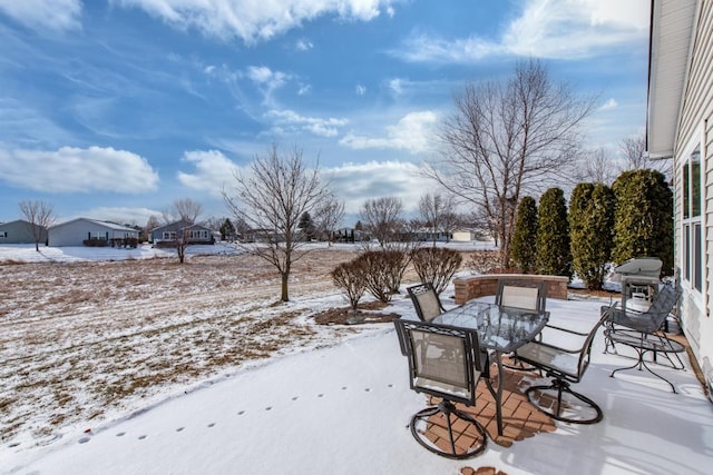 view of snow covered patio