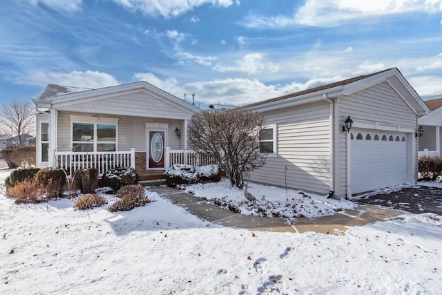 view of front of property featuring a porch and a garage