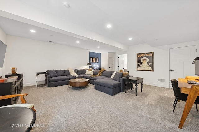 living room with carpet, visible vents, baseboards, and recessed lighting