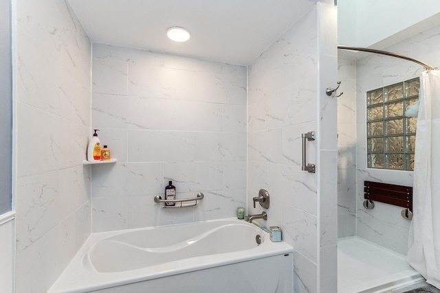 bathroom with shower with separate bathtub