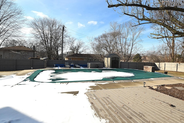 view of pool featuring a shed